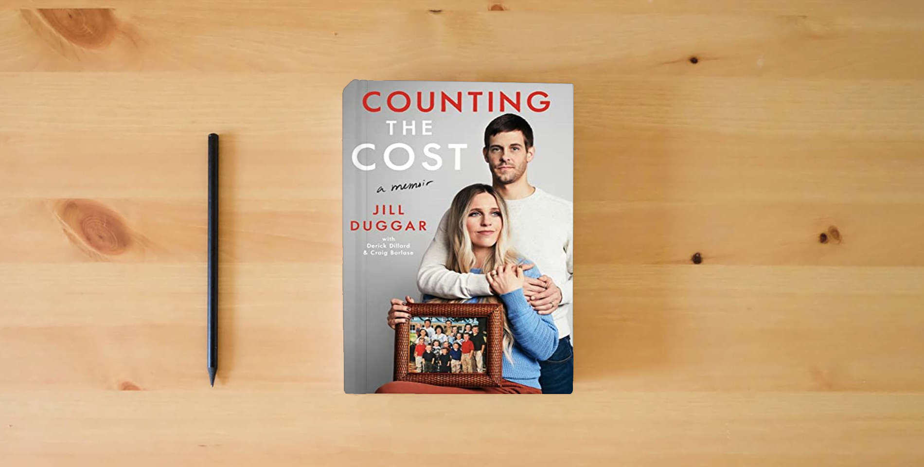 The book Counting the Cost is on the table