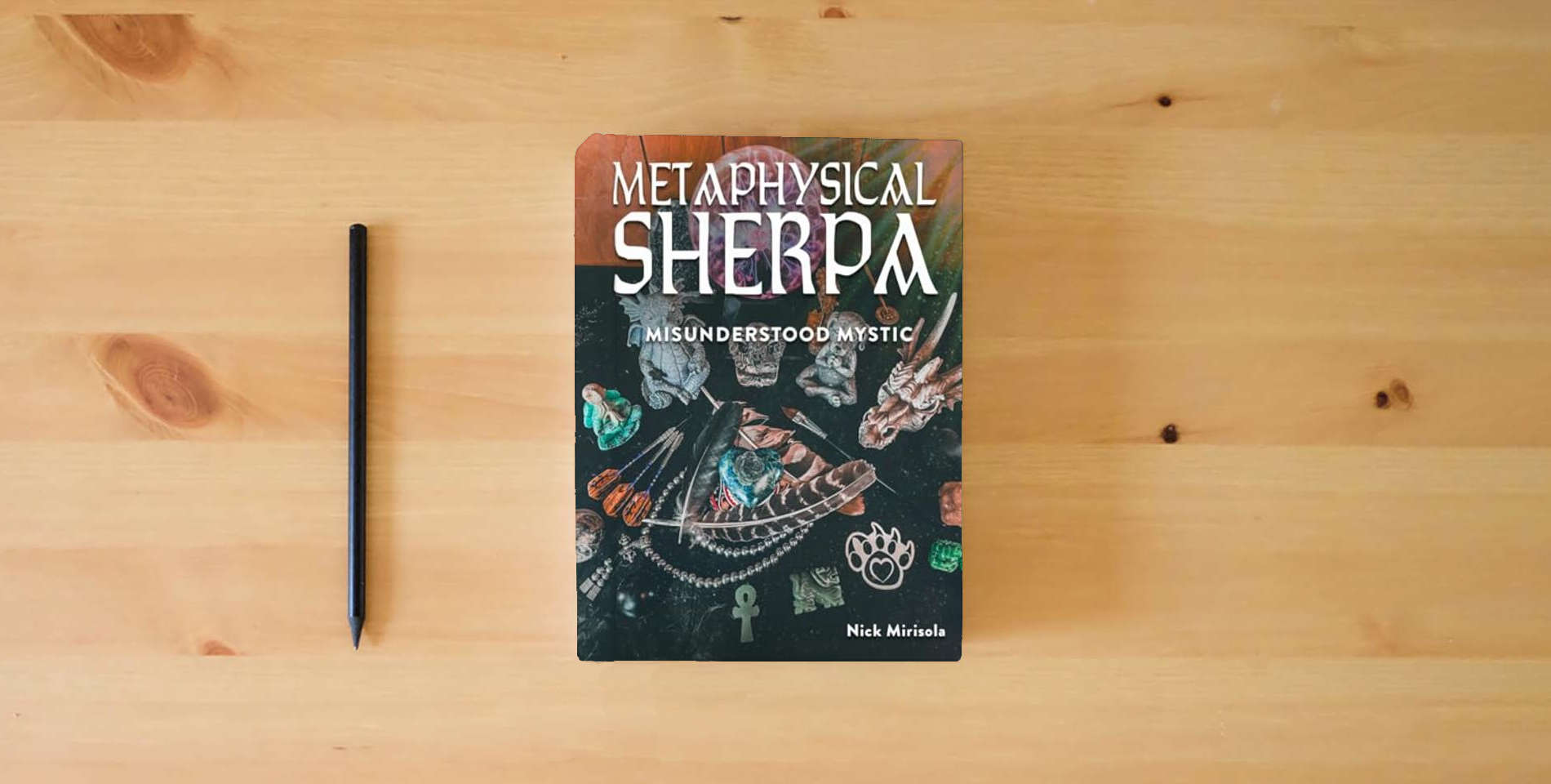 The book Metaphysical Sherpa: Misunderstood Mystic is on the table