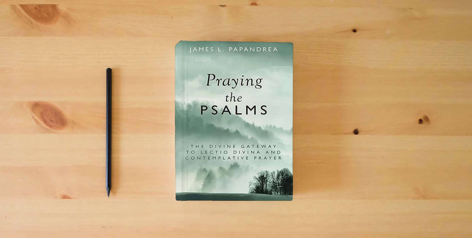 The book Praying the Psalms: The Divine Gateway to Lectio Divina and Contemplative Prayer is on the table