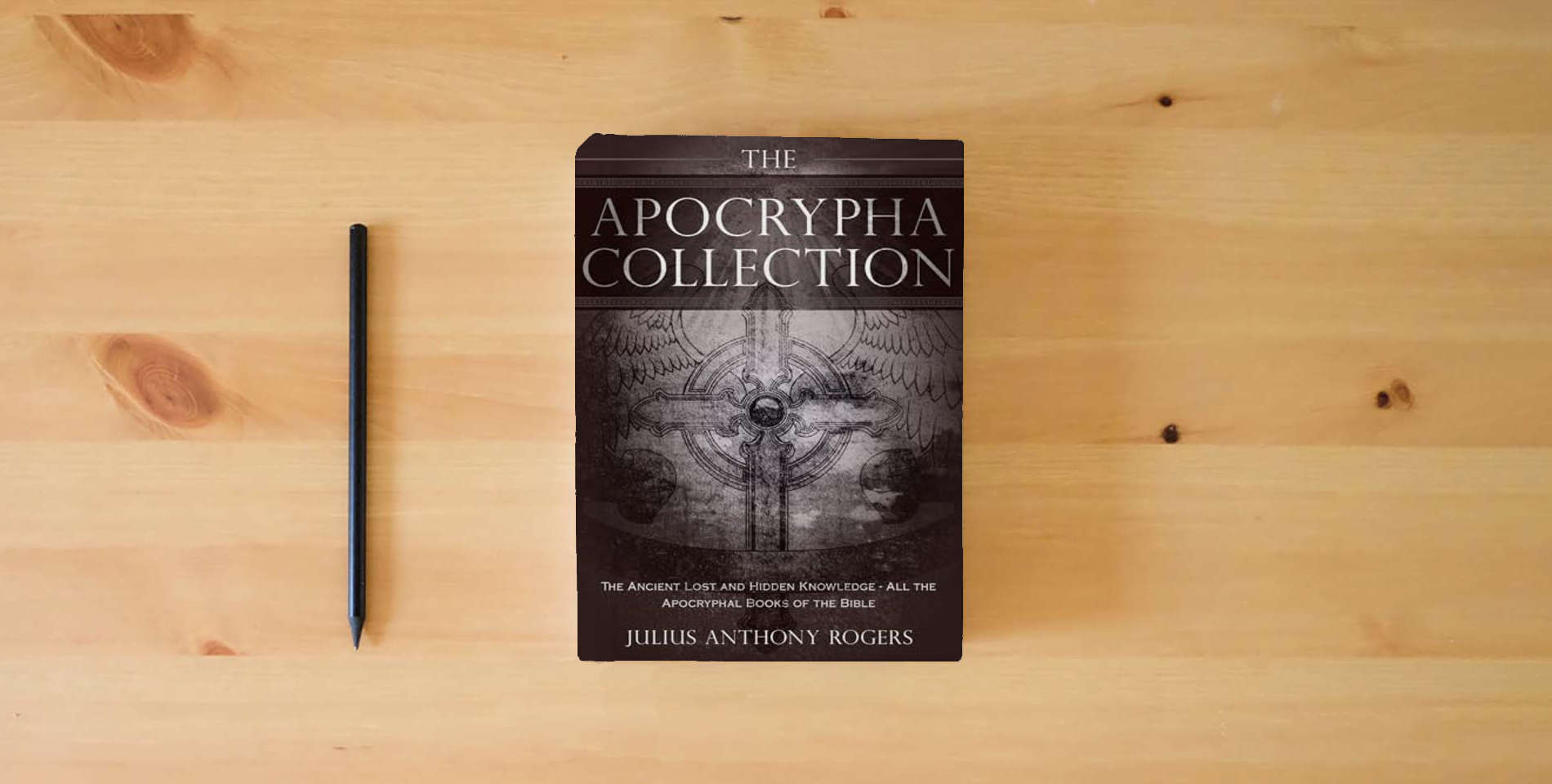 The book The Apocrypha Collection: The Ancient Lost and Hidden Knowledge - All the Apocryphal Books of the Bible is on the table