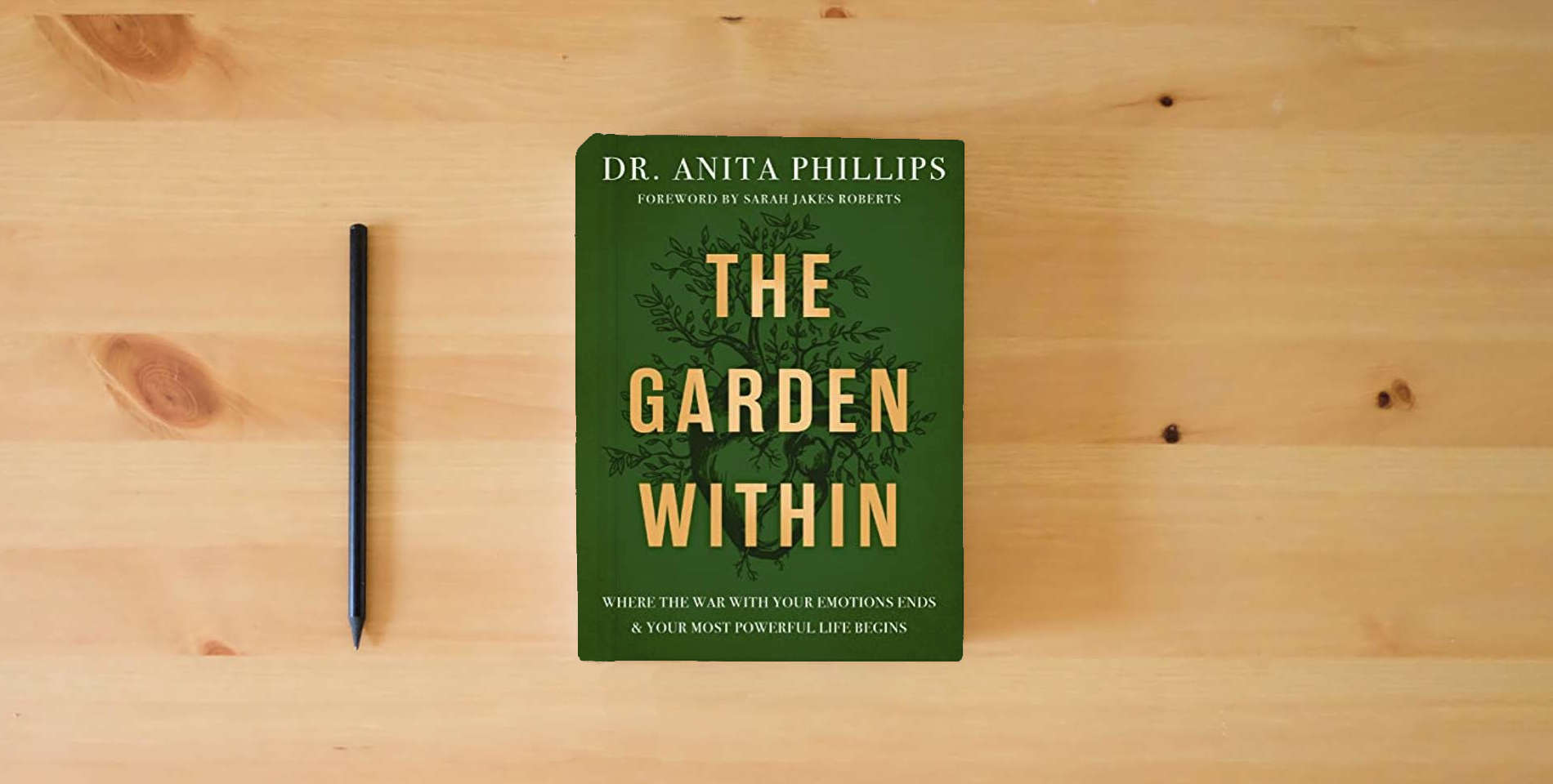 The book The Garden Within: Where the War with Your Emotions Ends and Your Most Powerful Life Begins is on the table