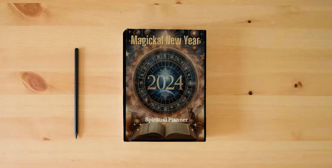 The book 2024 Magickal New Year Planner} is on the table