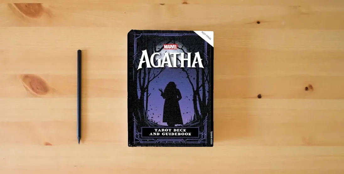 The book Agatha All Along Tarot Deck and Guidebook} is on the table