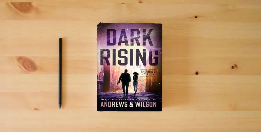 The book Dark Rising (The Shepherds Series)} is on the table