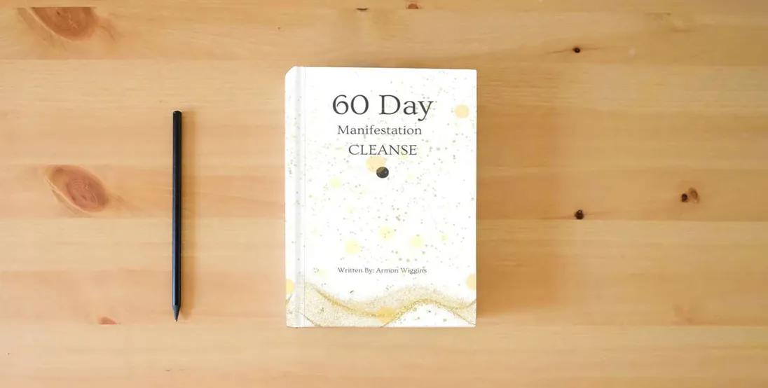 The book 60 Day Manifestation Cleanse: Manifestation Journal} is on the table