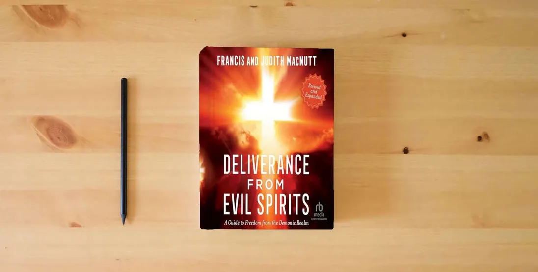The book Deliverance from Evil Spirits: A Guide to Freedom from the Demonic Realm} is on the table