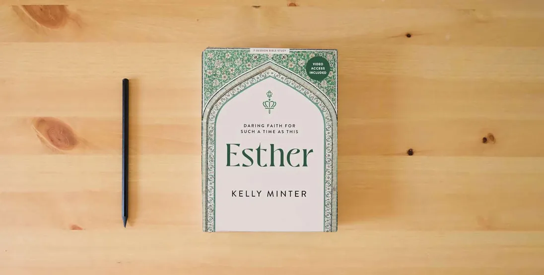 The book Esther: Daring Faith for Such a Time as This - Bible Study Book with Video Access} is on the table