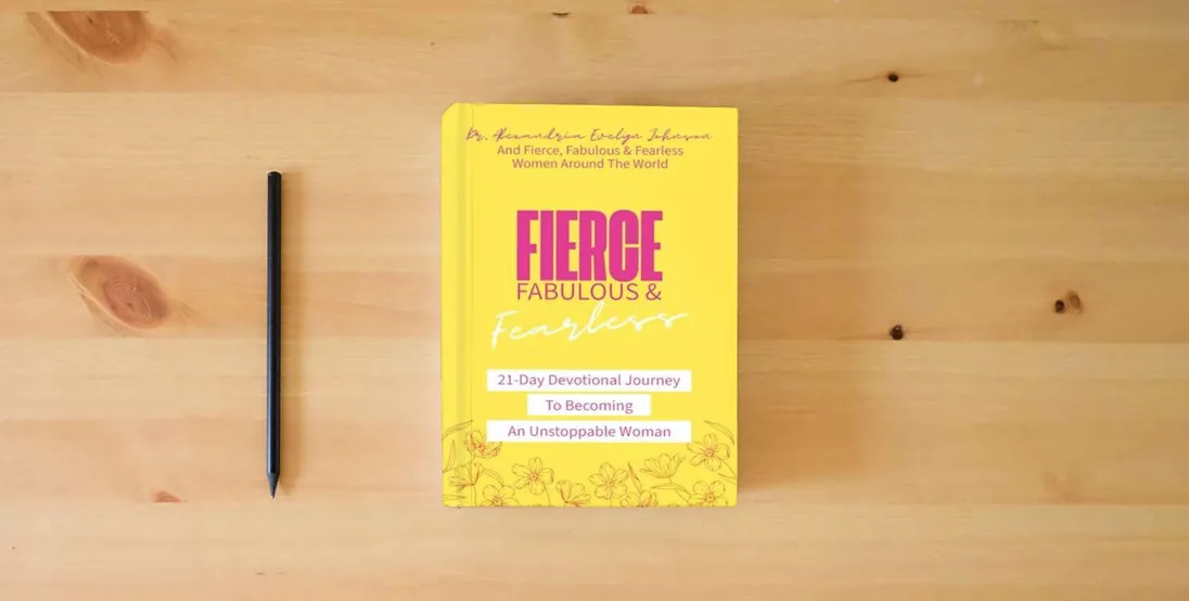 The book Fierce, Fabulous & Fearless: A 21-Day Devotional Journey To Becoming An Unstoppable Woman} is on the table