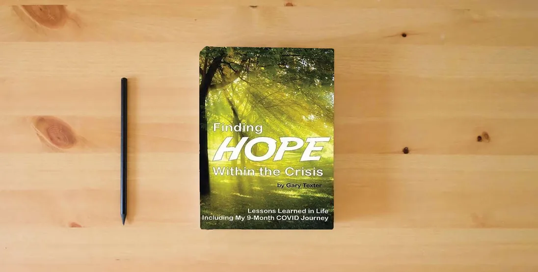 The book Finding Hope Within the Crisis: Lessons Learned in Life Including My 9-Month COVID Journey} is on the table