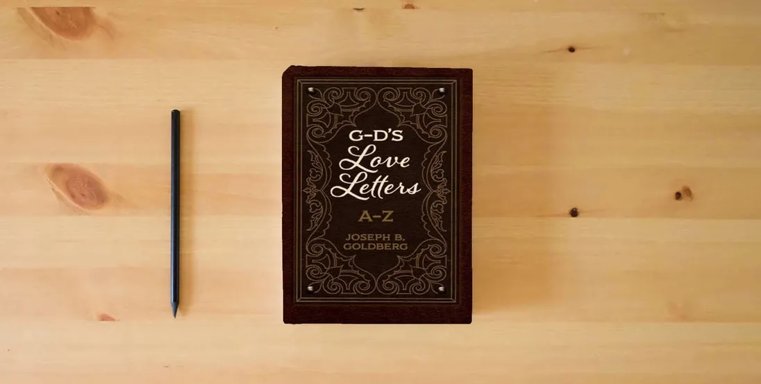 The book G-D's Love Letters} is on the table
