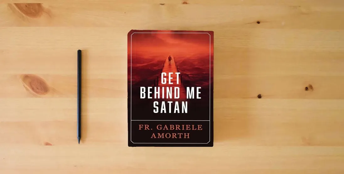 The book Get Behind Me Satan} is on the table