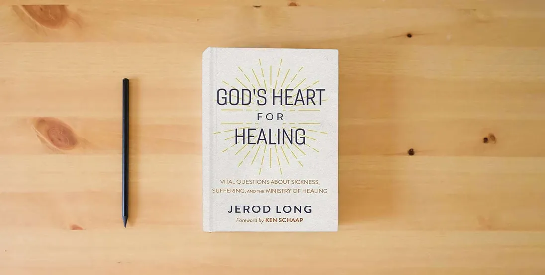 The book God's Heart For Healing: Vital Questions About Sickness, Suffering, and the Ministry of Healing} is on the table