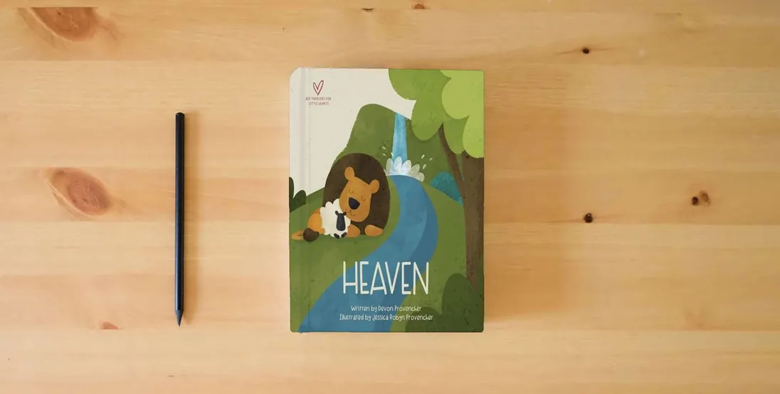 The book Heaven (Big Theology for Little Hearts)} is on the table