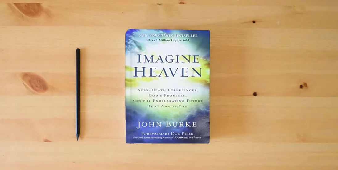 The book Imagine Heaven: Near-Death Experiences, God's Promises, and the Exhilarating Future That Awaits You} is on the table