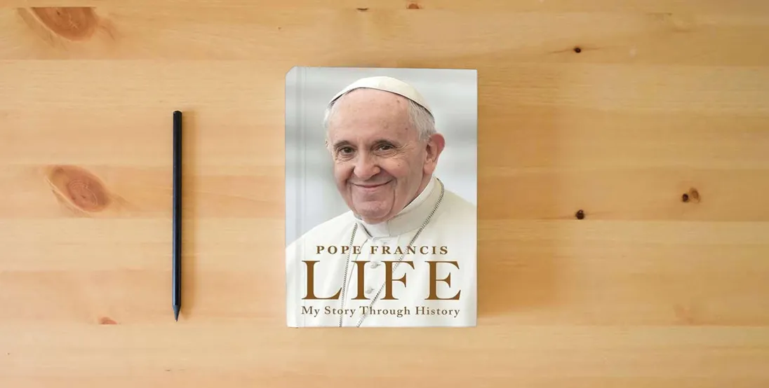 The book Life: My Story Through History: Pope Francis's Inspiring Biography Through History} is on the table