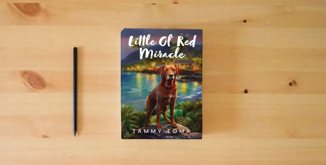 The book Little Ol' Red Miracle} is on the table