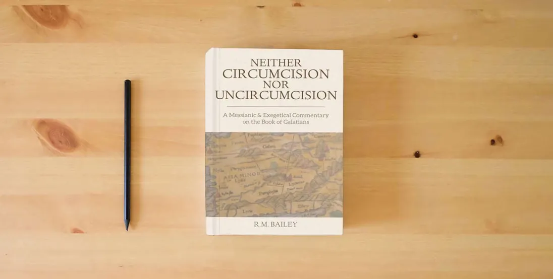 The book Neither Circumcision Nor Uncircumcision: A Messianic and Exegetical Commentary on the Book of Galatians} is on the table