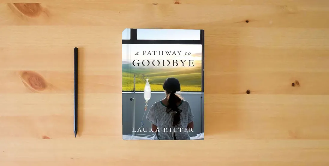 The book A Pathway to Goodbye} is on the table