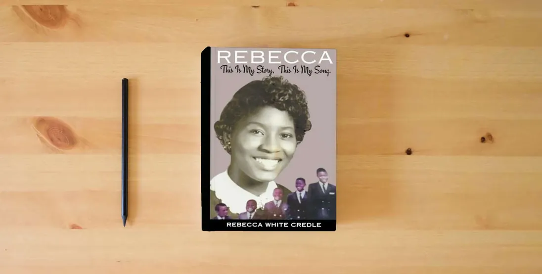 The book Rebecca: This Is My Story. This Is My Song.} is on the table