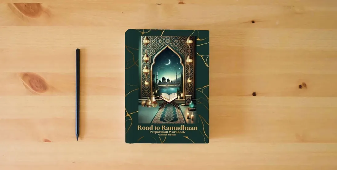 The book Road to Ramadhaan: Preparation Workbook} is on the table