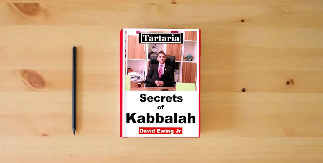 The book Tartaria - Secrets of Kabbalah: English} is on the table