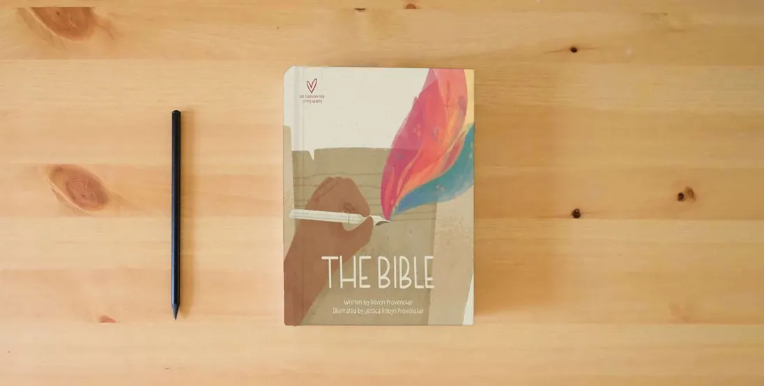 The book The Bible (Big Theology for Little Hearts)} is on the table