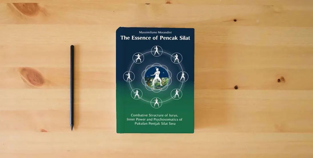 The book The Essence of Pencak Silat: Combative Structure of Jurus, Inner Power and Psychosomatic Power of Pukulan Pentjak Silat Sera} is on the table