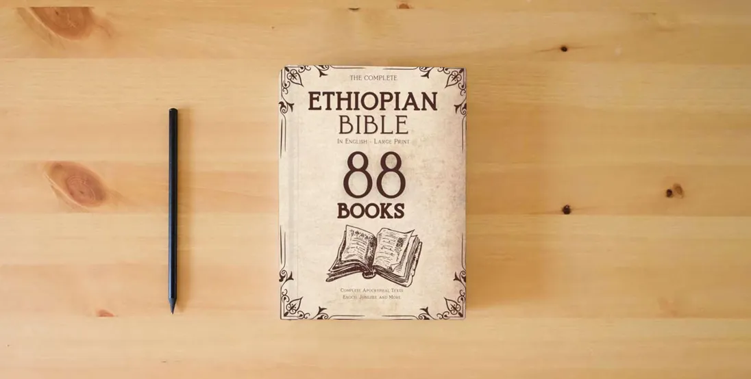 The book The Ethiopian Bible: A Guide to Ancient Wisdom and Apocryphal Texts to Illuminate and Strengthen Your Spiritual Path} is on the table