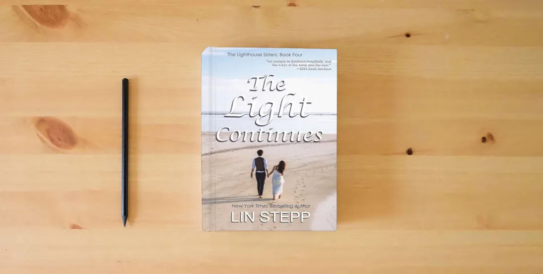 The book The Light Continues} is on the table