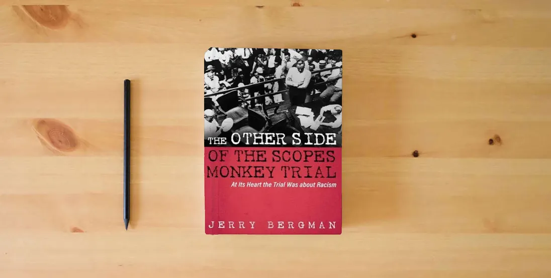 The book The Other Side of the Scopes Monkey Trial: At Its Heart the Trial Was about Racism} is on the table
