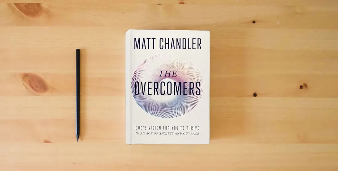 The book The Overcomers: God's Vision for You to Thrive in an Age of Anxiety and Outrage} is on the table