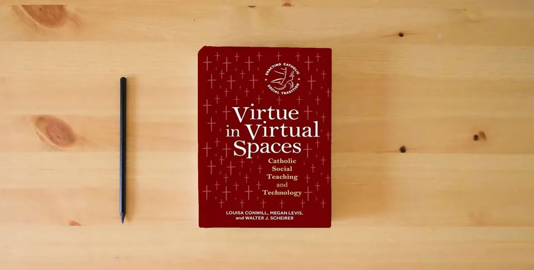 The book Virtue in Virtual Spaces: Catholic Social Teaching and Technology (Enacting Catholic Social Tradition)} is on the table