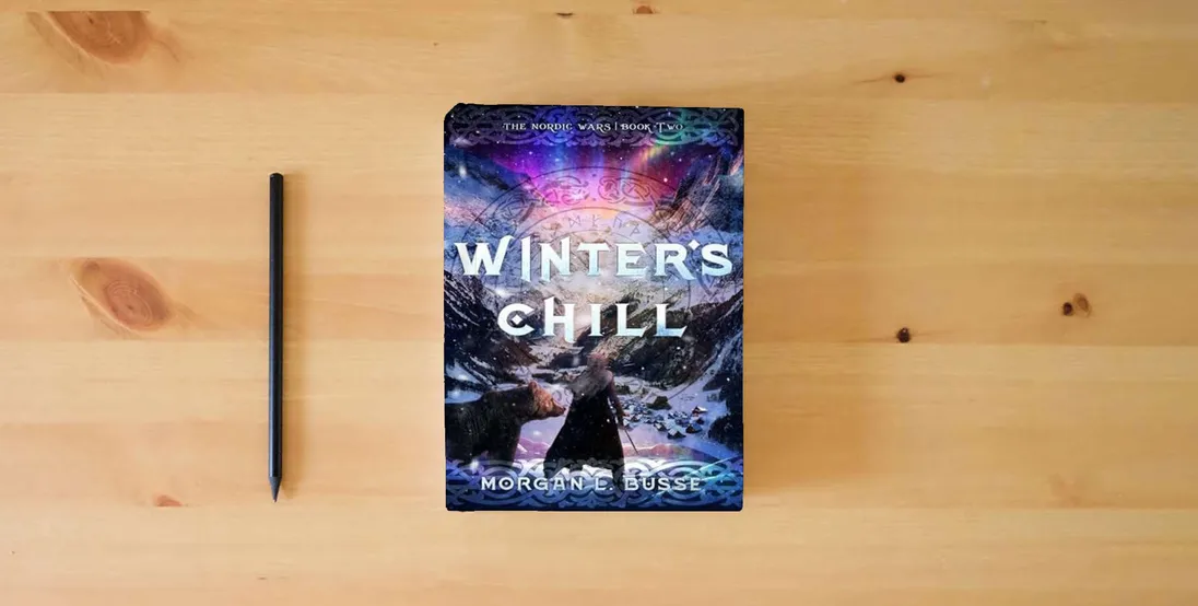 The book Winter's Chill (Volume 2) (The Nordic Wars)} is on the table