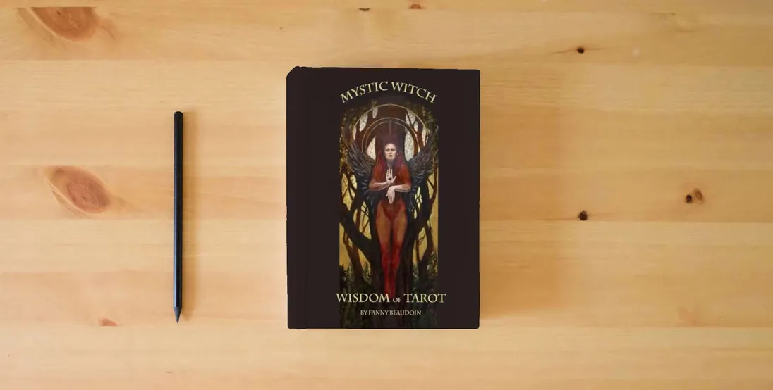 The book Wisdom of Tarot} is on the table