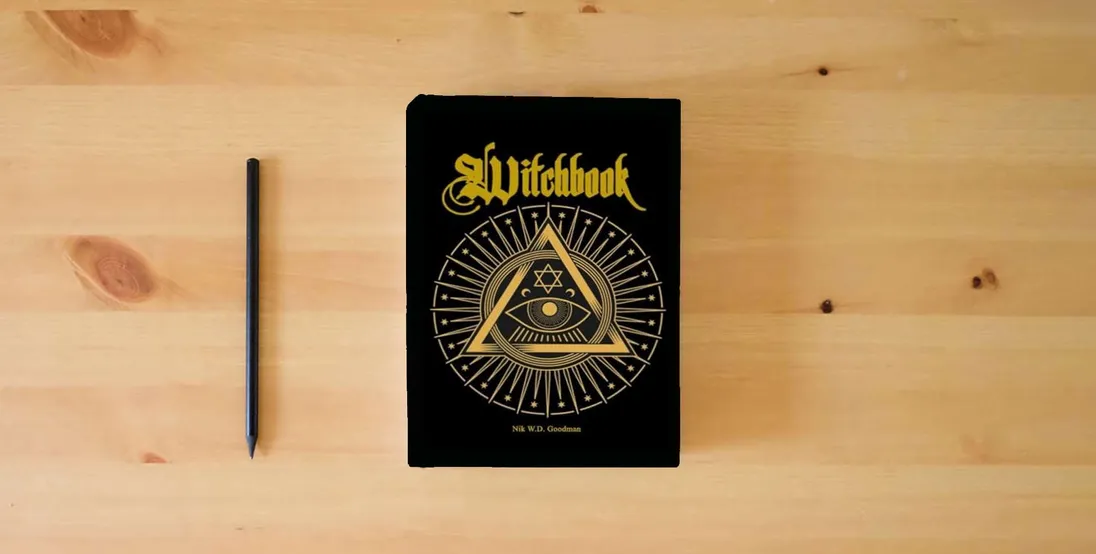 The book Witchbook: The Fundamental Book of Witchcraft in Theory – Knowledge – Practice – Rituals} is on the table