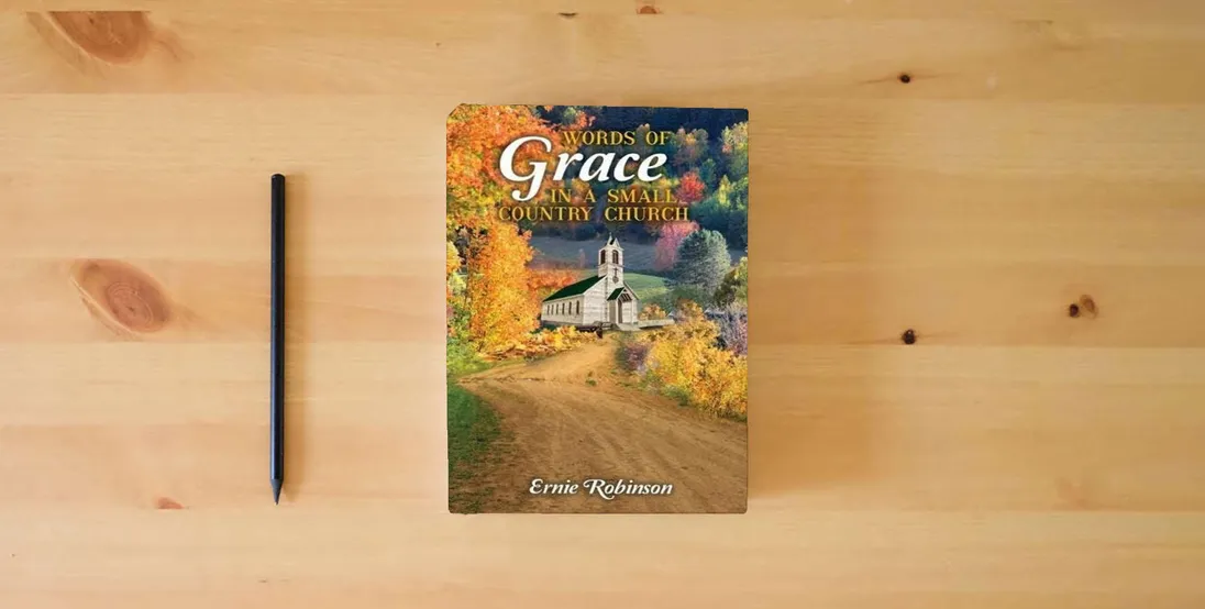 The book Words of Grace in a Small Country Church} is on the table
