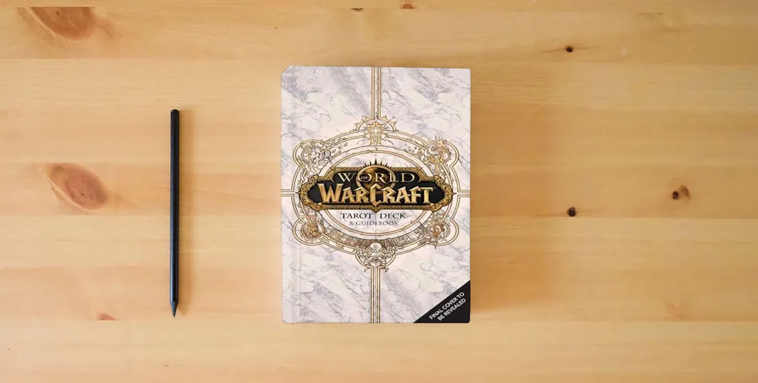 The book World of Warcraft: The Official Tarot Deck and Guidebook} is on the table